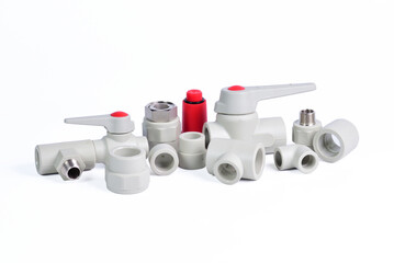 Plumbing fixtures and piping parts plastic fittings isolated on a white background