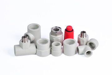 Plumbing fixtures and piping parts plastic fittings isolated on a white background