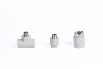 Plumbing fixtures and piping parts plastic fittings isolated on a white background