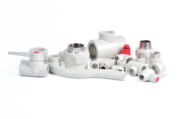 Plumbing fixtures and piping parts plastic fittings isolated on a white background