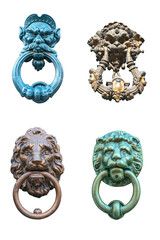 old door handle in the form of a lion's head with a ring in his mouth isolated on a white background - 498800509