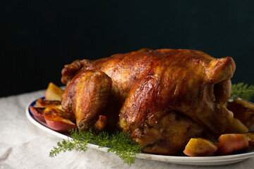 Ruddy chicken with apples and herbs