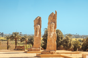 Colossal statues of pharaohs in Luxor or ancient Thebes. Tourist attractions in Egypt