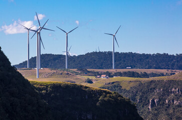Landscape with wind turbines for power generation.