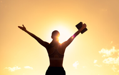 Young woman holding up bible. religious belief 
