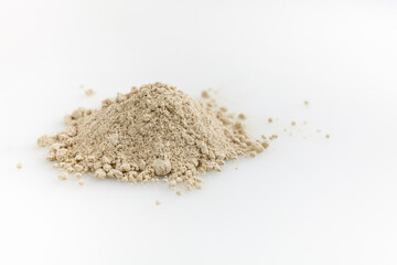 Heap of ginger powder. Isolated on white. Copy space.