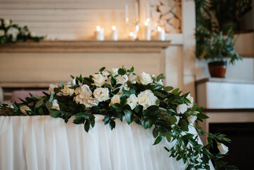 The presidium of the newlyweds in the banquet hall of the restaurant