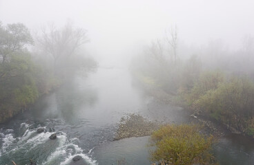 Fototapeta na wymiar mist on the river