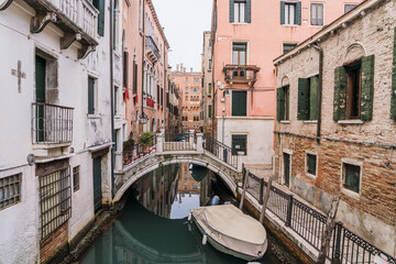 Beautiful antique street canal in Venice, Italy 