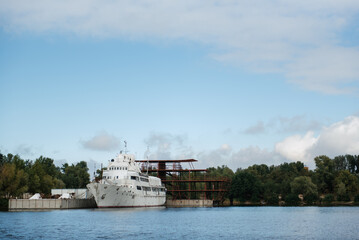 an old white ship with traces of rust