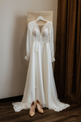 dress up the bride in a wedding dress with corset and lacing