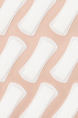 Women's sanitary pads on a pink background pattern