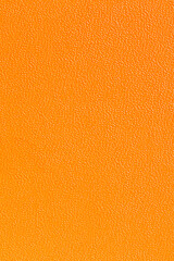 Orange background. Orange texture.Surface of orange texture. Vintage background. Vertical...