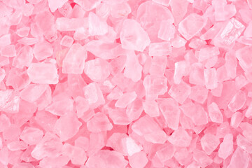 Fototapeta premium Salt crystals, sea salt as background and texture. Ice crystals pink