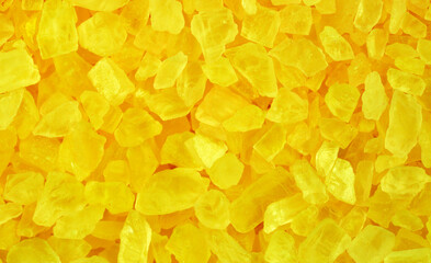 Salt crystals, sea salt as background and texture. Ice crystals yellow