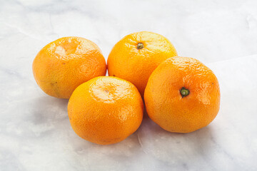 Fresh ripe juicy yellow mandarin