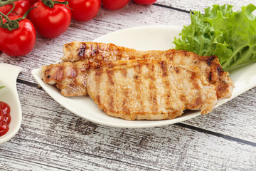 Grilled pork steak with ketchup