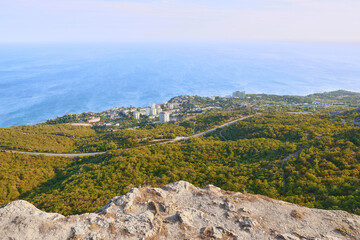Fototapeta na wymiar View of the village of Foros and the Black Sea from the top of the mountain. Sevastopol highway.