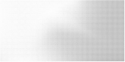 Halftone dotted background. Black dots in modern style on a white background.