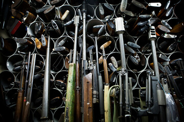 Criminal research ballistics department: stock of reference weapons. - obrazy, fototapety, plakaty