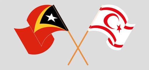 Crossed and waving flags of East Timor and Northern Cyprus