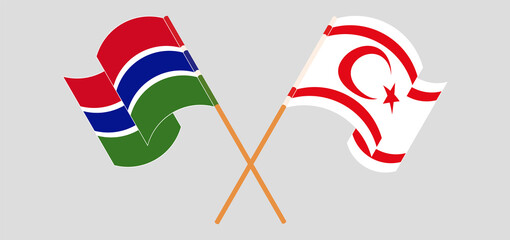 Crossed and waving flags of the Gambia and Northern Cyprus