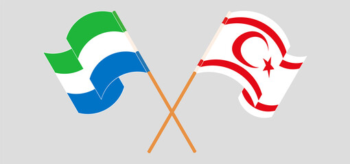 Crossed and waving flags of Sierra Leone and Northern Cyprus