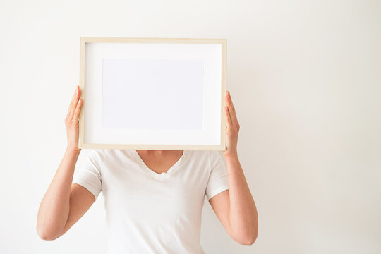 Wooden frames with empty space in the bedroom. 