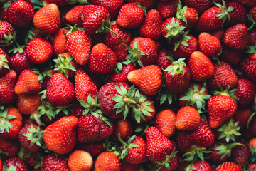 Strawberry top view background. Summer food pattern. Raw fresh farming berries. Healthy eating concept. Raw foodism.