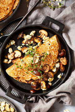 North Staffordshire Oatcake Pancakes With Blue Cheese, Mushrooms And Thyme.