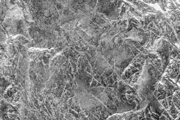 Stone background of textured stone horizontal photography. Stone with textured marble effect is abstract art object close-up.