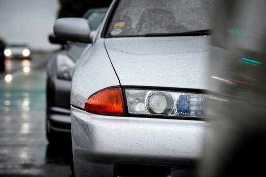 JDM shot on a rainy day. 
Details of car. Car culture. Classic Car. Sports car. Automotive. 