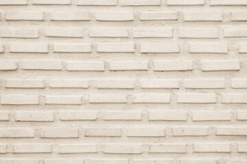 Empty background of wide cream brick wall texture. Beige old brown brick wall concrete or stone textured design backdrop.