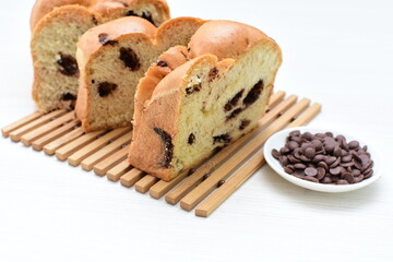 Artisanal bread with a touch of chocolate, displayed on white wood