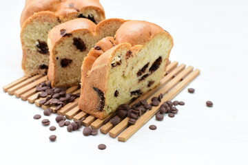 Artisanal bread with a touch of chocolate, displayed on white wood