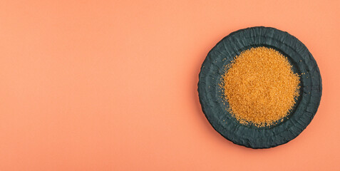 Saccharum officinarum - Organic brown sugar in the bowl