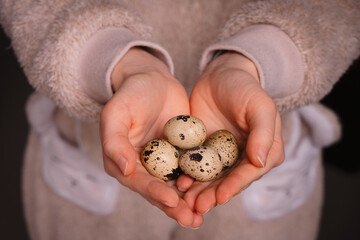 Eggs held in hands of an woman. The shot taken with a selective focus. Easter concept