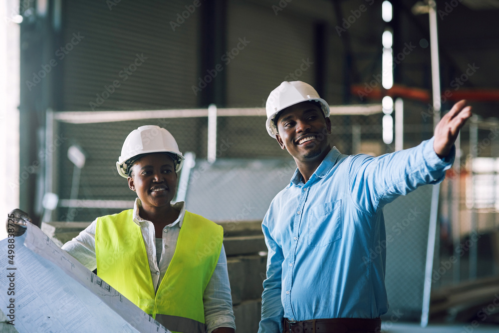 Poster the safe way is the smart way. shot of two builders having a meeting at a construction site.