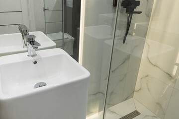 Sink and faucet close up. Bathroom interior with sink.