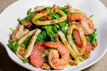 Spicy squid and shrimp salad. Thai food, spicy octopus, squid salad