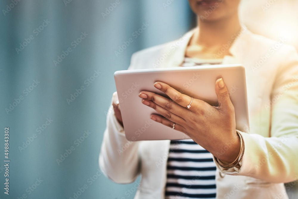 Poster wherever she goes, success simply tags along. closeup shot of an unrecognizable businesswoman using 