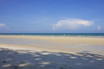 Obraz premium The Turquoise colored sand blue sky on sunny day and space on the sky