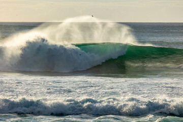 waves crashing on rocks
