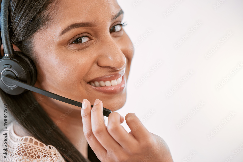 Poster Ive got you. Cropped portrait of an attractive young female call center agent wearing a headset while working in the office.