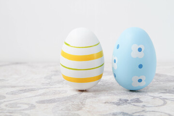 Easter. Multicolored eggs. Yellow and blue Easter decorations.
