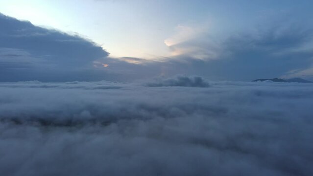 aerial view of smooth cloud flowing in the morning with sun light.concept for freedom,liberate, relieve, unchain