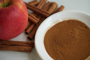 Cinnamon spice, cinnamon sticks, apple