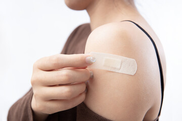Adult women are vaccinated on the shoulder