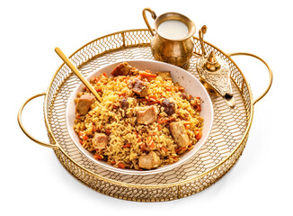 Tray with plate of traditional pilaf and Aladdin lamp on white background