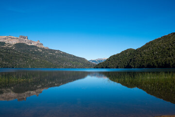 Naklejka na ściany i meble Beautiful summer landscape with lake between mountains in Argentina
